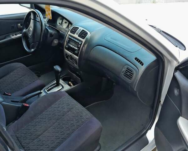 Серый Мазда 323, объемом двигателя 2 л и пробегом 258 тыс. км за 2800 $, фото 8 на Automoto.ua