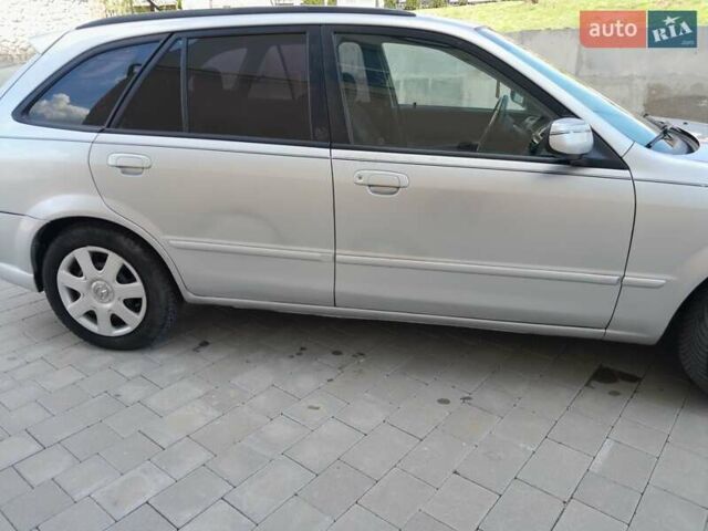 Серый Мазда 323, объемом двигателя 2 л и пробегом 258 тыс. км за 2800 $, фото 6 на Automoto.ua