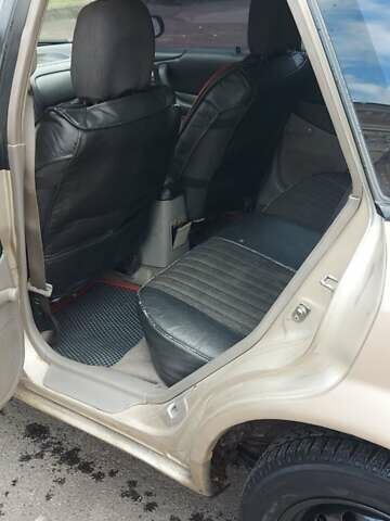 Серый Мазда 323, объемом двигателя 1.3 л и пробегом 280 тыс. км за 2150 $, фото 8 на Automoto.ua