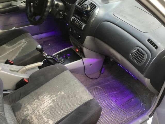 Серый Мазда 323, объемом двигателя 0 л и пробегом 358 тыс. км за 830 $, фото 6 на Automoto.ua