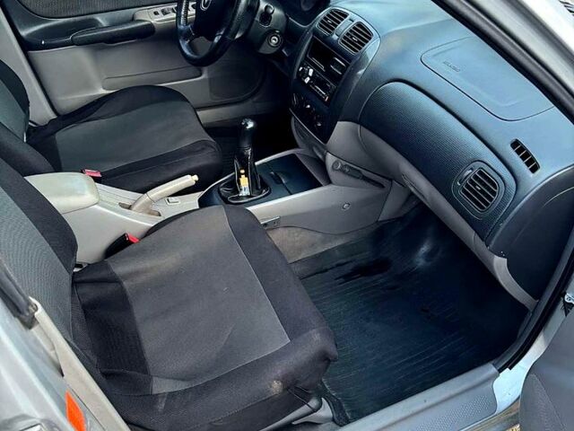 Серый Мазда 323, объемом двигателя 2 л и пробегом 200 тыс. км за 1900 $, фото 4 на Automoto.ua