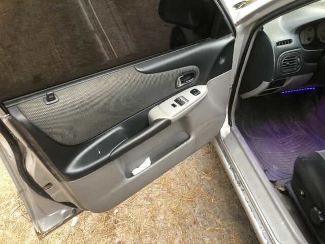 Серый Мазда 323, объемом двигателя 2 л и пробегом 358 тыс. км за 1200 $, фото 16 на Automoto.ua