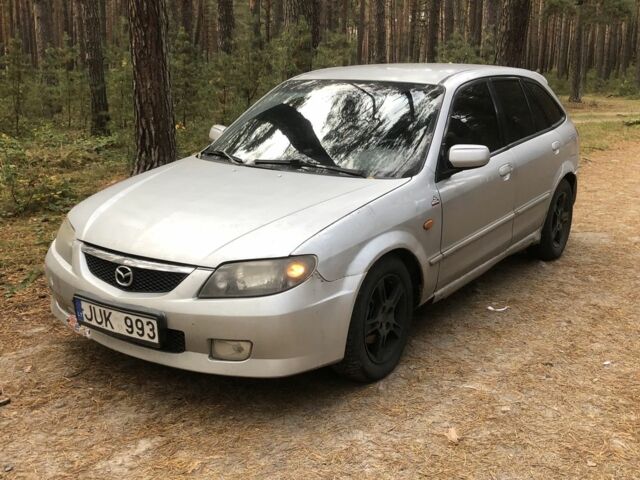 Серый Мазда 323, объемом двигателя 2 л и пробегом 358 тыс. км за 850 $, фото 1 на Automoto.ua