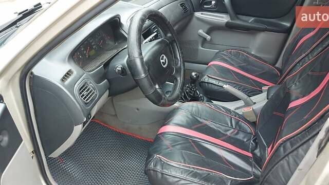 Серый Мазда 323, объемом двигателя 1.3 л и пробегом 280 тыс. км за 2150 $, фото 6 на Automoto.ua