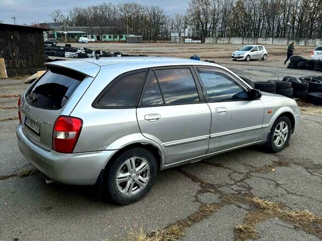 Серый Мазда 323, объемом двигателя 2 л и пробегом 200 тыс. км за 1900 $, фото 7 на Automoto.ua