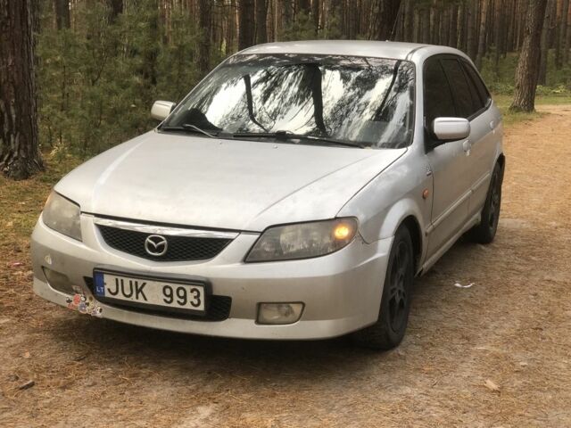 Серый Мазда 323, объемом двигателя 2 л и пробегом 358 тыс. км за 1200 $, фото 1 на Automoto.ua