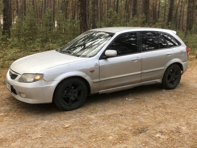 Серый Мазда 323, объемом двигателя 2 л и пробегом 358 тыс. км за 850 $, фото 4 на Automoto.ua