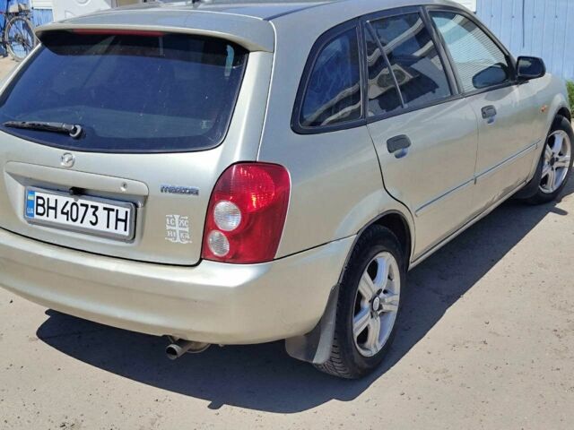 Серый Мазда 323, объемом двигателя 1.6 л и пробегом 1000 тыс. км за 2100 $, фото 1 на Automoto.ua