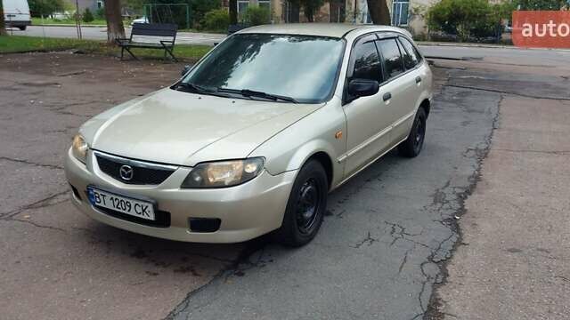 Серый Мазда 323, объемом двигателя 1.3 л и пробегом 280 тыс. км за 2150 $, фото 4 на Automoto.ua