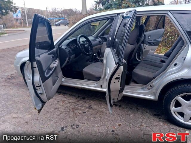 Сірий Мазда 323, об'ємом двигуна 1.6 л та пробігом 200 тис. км за 1800 $, фото 6 на Automoto.ua