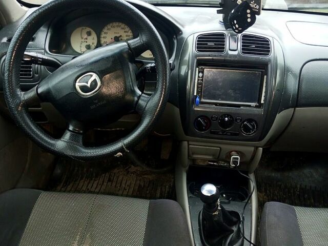 Сірий Мазда 323, об'ємом двигуна 1.6 л та пробігом 177 тис. км за 1300 $, фото 2 на Automoto.ua