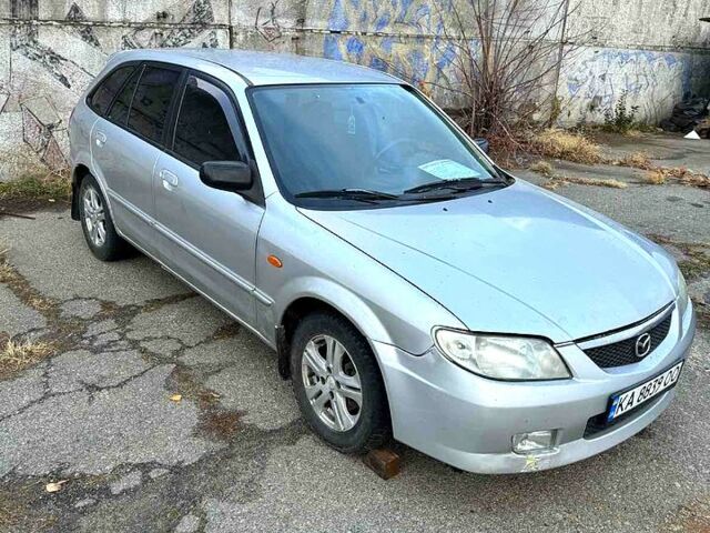 Серый Мазда 323, объемом двигателя 2 л и пробегом 200 тыс. км за 1900 $, фото 3 на Automoto.ua