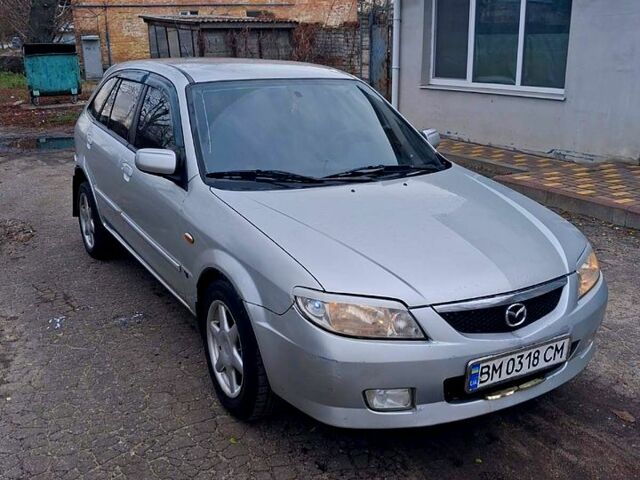 Серый Мазда 323, объемом двигателя 1.6 л и пробегом 200 тыс. км за 1800 $, фото 1 на Automoto.ua