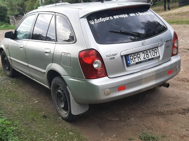 Серый Мазда 323, объемом двигателя 2 л и пробегом 230 тыс. км за 700 $, фото 2 на Automoto.ua