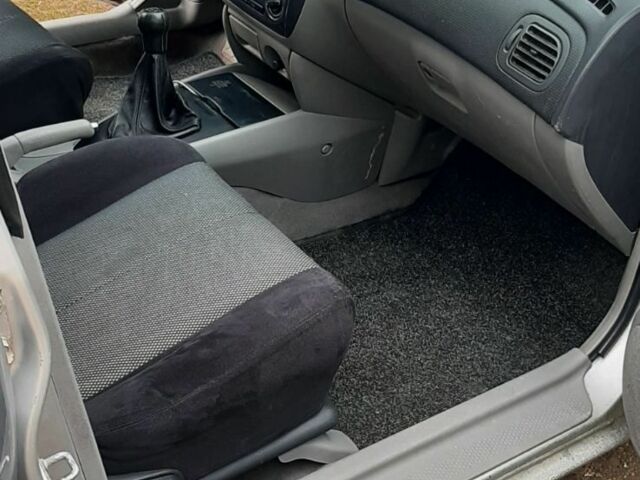 Серый Мазда 323, объемом двигателя 2 л и пробегом 230 тыс. км за 700 $, фото 5 на Automoto.ua