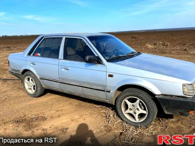 Серый Мазда 323, объемом двигателя 1.3 л и пробегом 123 тыс. км за 700 $, фото 4 на Automoto.ua