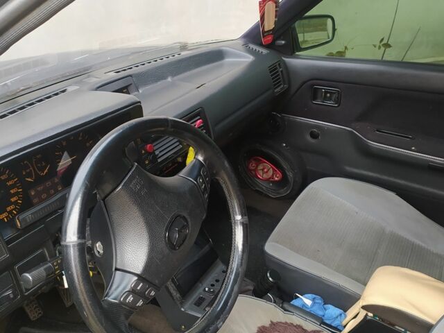 Сірий Мазда 323, об'ємом двигуна 1.7 л та пробігом 400 тис. км за 1000 $, фото 5 на Automoto.ua