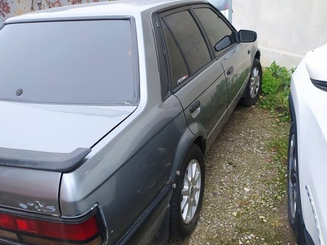 Сірий Мазда 323, об'ємом двигуна 1.7 л та пробігом 400 тис. км за 1000 $, фото 4 на Automoto.ua