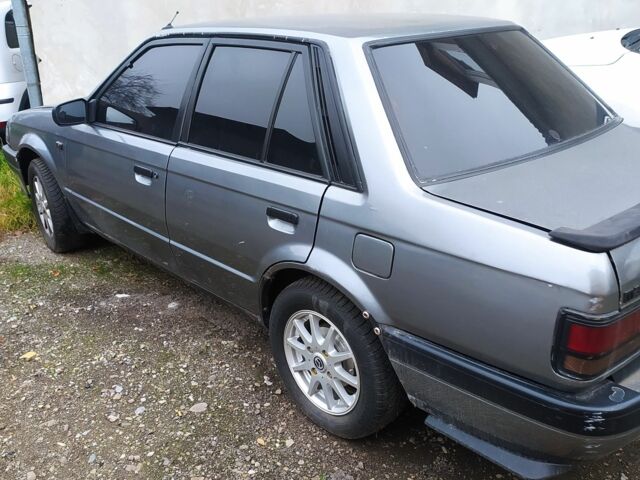 Сірий Мазда 323, об'ємом двигуна 1.7 л та пробігом 400 тис. км за 1000 $, фото 2 на Automoto.ua