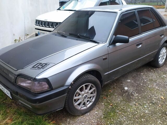 Сірий Мазда 323, об'ємом двигуна 1.7 л та пробігом 400 тис. км за 1000 $, фото 1 на Automoto.ua