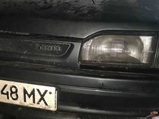 Серый Мазда 323, объемом двигателя 2 л и пробегом 200 тыс. км за 306 $, фото 2 на Automoto.ua