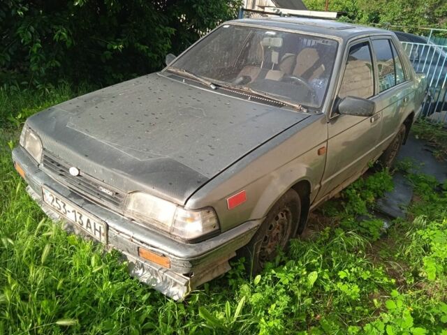 Серый Мазда 323, объемом двигателя 0 л и пробегом 999 тыс. км за 270 $, фото 2 на Automoto.ua