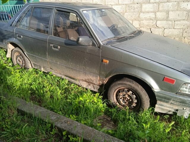 Серый Мазда 323, объемом двигателя 0 л и пробегом 999 тыс. км за 270 $, фото 3 на Automoto.ua