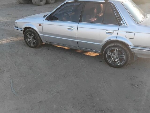 Серый Мазда 323, объемом двигателя 1.6 л и пробегом 347 тыс. км за 500 $, фото 4 на Automoto.ua