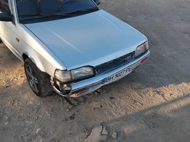 Серый Мазда 323, объемом двигателя 1.6 л и пробегом 347 тыс. км за 500 $, фото 3 на Automoto.ua