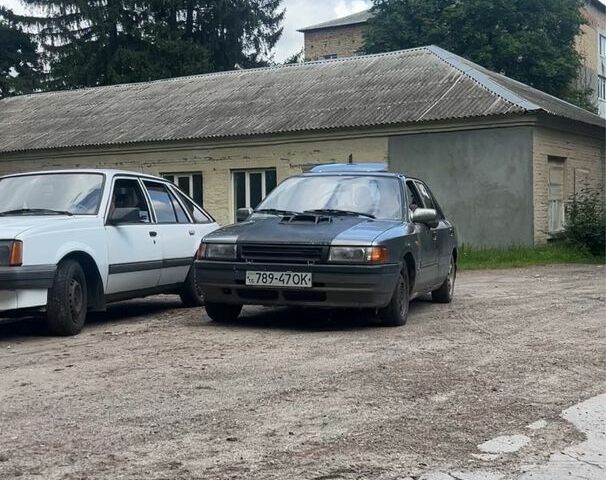 Серый Мазда 323, объемом двигателя 1.6 л и пробегом 550 тыс. км за 418 $, фото 6 на Automoto.ua