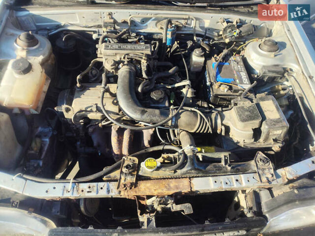 Сірий Мазда 323, об'ємом двигуна 1.6 л та пробігом 227 тис. км за 593 $, фото 1 на Automoto.ua