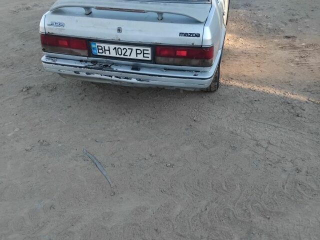 Серый Мазда 323, объемом двигателя 1.6 л и пробегом 347 тыс. км за 500 $, фото 1 на Automoto.ua