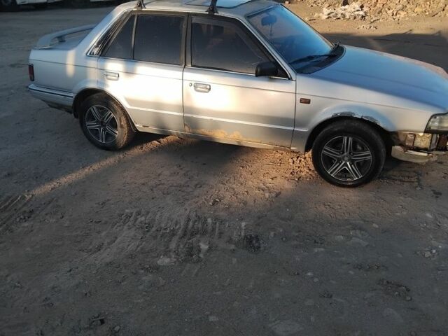 Серый Мазда 323, объемом двигателя 1.6 л и пробегом 347 тыс. км за 500 $, фото 2 на Automoto.ua