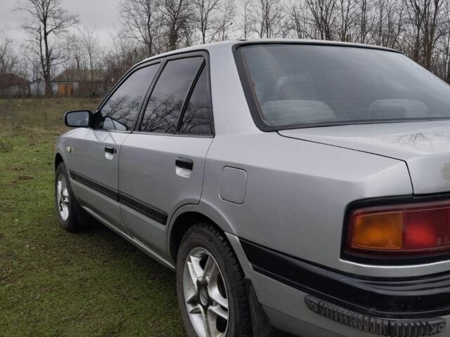 Серый Мазда 323, объемом двигателя 0 л и пробегом 417 тыс. км за 1700 $, фото 2 на Automoto.ua
