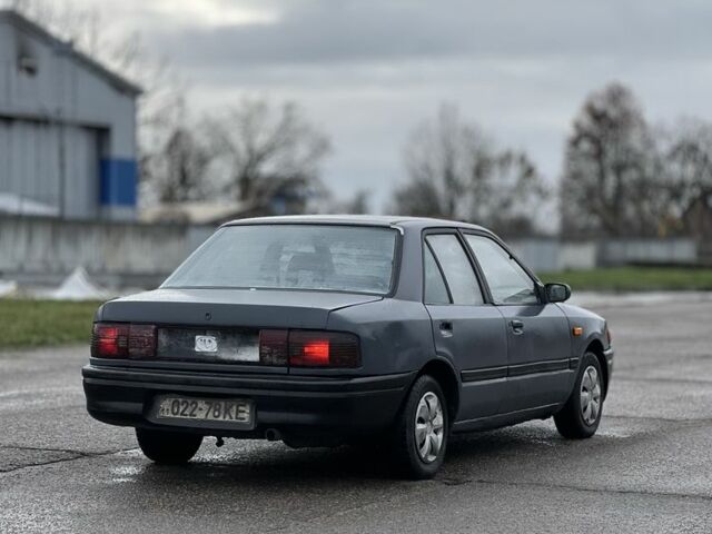 Серый Мазда 323, объемом двигателя 0 л и пробегом 100 тыс. км за 850 $, фото 6 на Automoto.ua