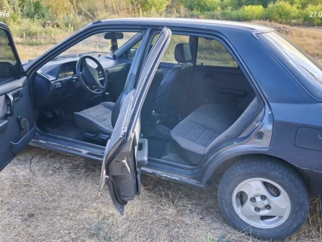 Серый Мазда 323, объемом двигателя 1.3 л и пробегом 260 тыс. км за 1600 $, фото 6 на Automoto.ua