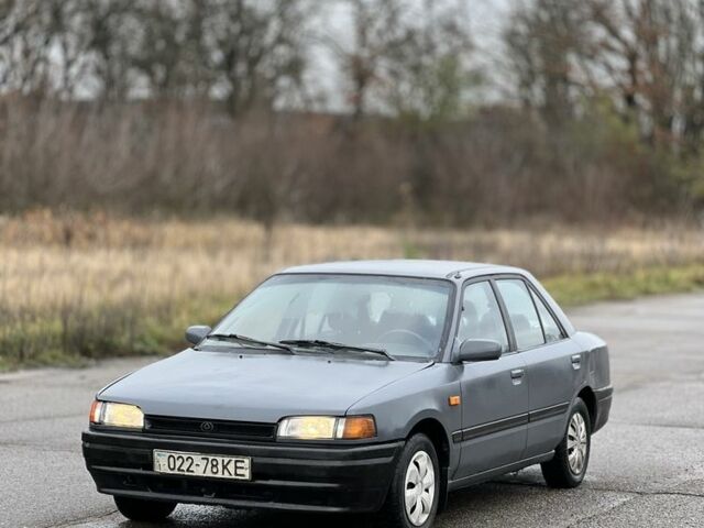 Серый Мазда 323, объемом двигателя 0 л и пробегом 100 тыс. км за 850 $, фото 4 на Automoto.ua