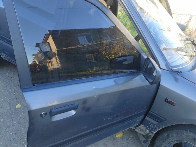 Серый Мазда 323, объемом двигателя 1.7 л и пробегом 29 тыс. км за 1600 $, фото 2 на Automoto.ua