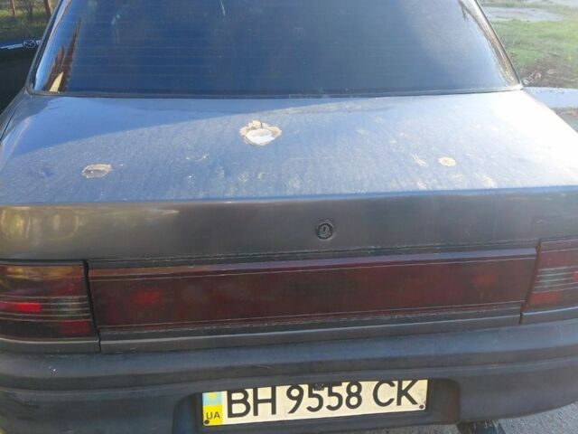 Серый Мазда 323, объемом двигателя 1.7 л и пробегом 29 тыс. км за 1600 $, фото 5 на Automoto.ua