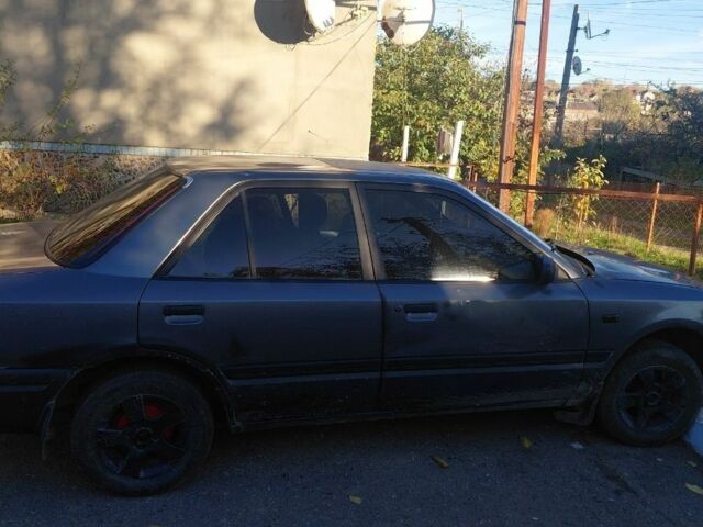 Серый Мазда 323, объемом двигателя 1.7 л и пробегом 29 тыс. км за 1600 $, фото 6 на Automoto.ua