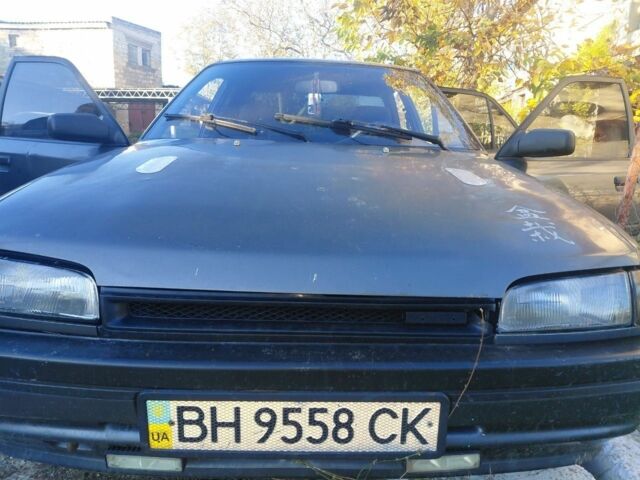 Серый Мазда 323, объемом двигателя 1.7 л и пробегом 29 тыс. км за 1600 $, фото 1 на Automoto.ua