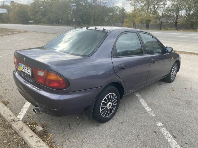 Серый Мазда 323, объемом двигателя 1.5 л и пробегом 370 тыс. км за 1699 $, фото 5 на Automoto.ua