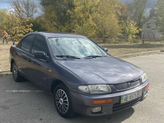 Серый Мазда 323, объемом двигателя 1.5 л и пробегом 370 тыс. км за 1699 $, фото 8 на Automoto.ua