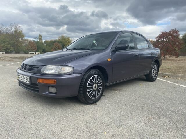 Серый Мазда 323, объемом двигателя 1.5 л и пробегом 370 тыс. км за 1699 $, фото 2 на Automoto.ua