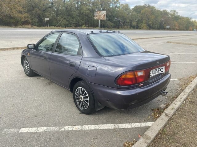 Серый Мазда 323, объемом двигателя 1.5 л и пробегом 370 тыс. км за 1699 $, фото 4 на Automoto.ua