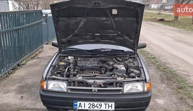 Сірий Мазда 323, об'ємом двигуна 1 л та пробігом 420 тис. км за 2700 $, фото 6 на Automoto.ua