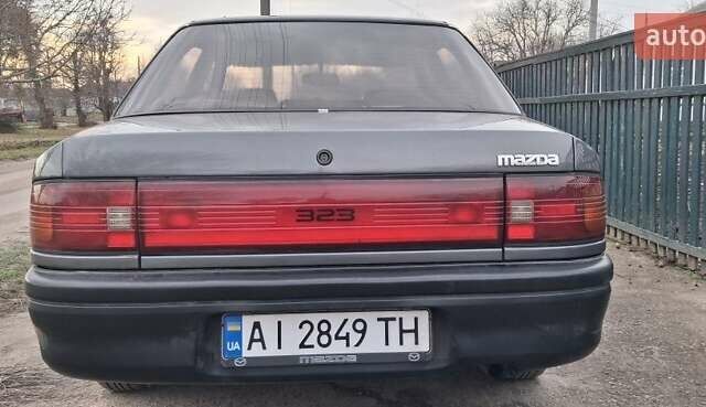 Сірий Мазда 323, об'ємом двигуна 1 л та пробігом 420 тис. км за 2700 $, фото 2 на Automoto.ua