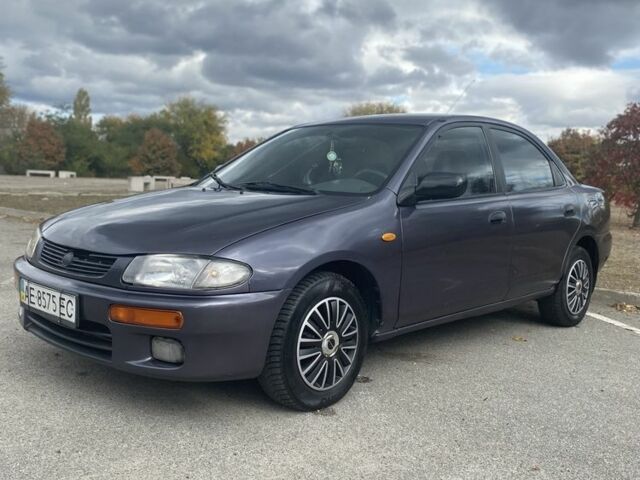 Серый Мазда 323, объемом двигателя 1.5 л и пробегом 370 тыс. км за 1699 $, фото 1 на Automoto.ua