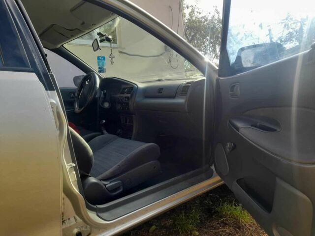 Серый Мазда 323, объемом двигателя 1.5 л и пробегом 2 тыс. км за 1000 $, фото 3 на Automoto.ua