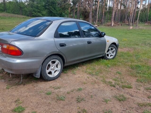 Сірий Мазда 323, об'ємом двигуна 1.5 л та пробігом 294 тис. км за 2000 $, фото 2 на Automoto.ua